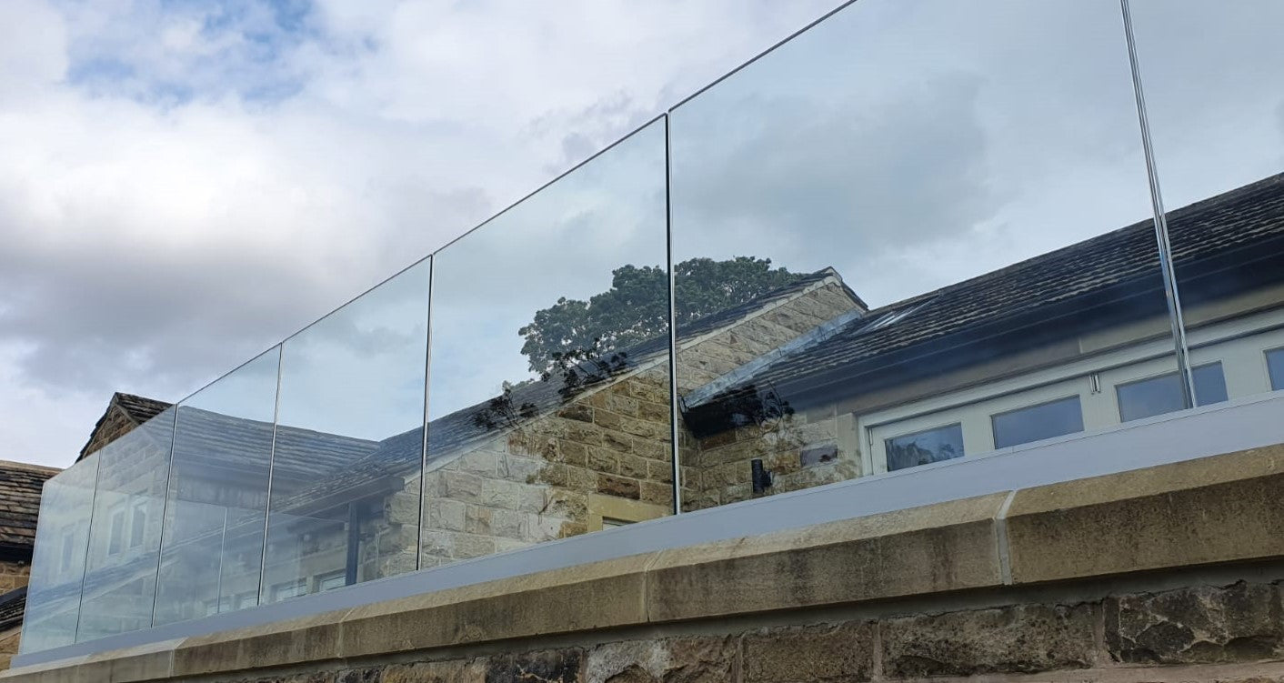 Toughened laminated glass